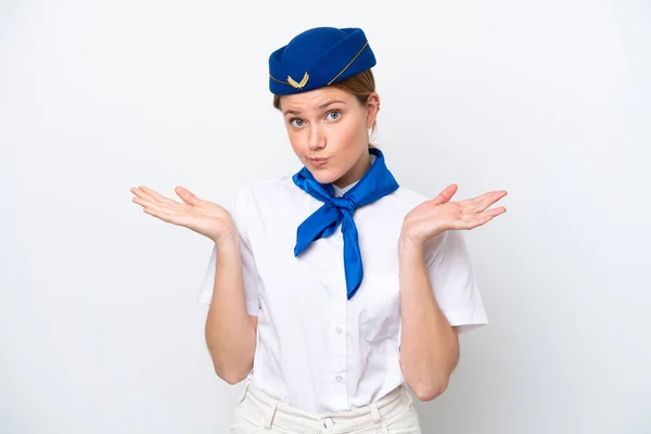 飛行機スチュワーデス女性は手を上げながら疑問を持ちながら白い背景に隔離 — ストック写真