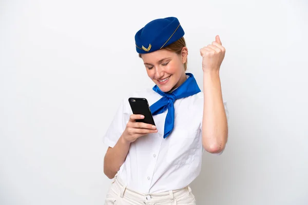 Stewardessa Samolotu Kobieta Izolowana Białym Tle Telefonem Pozycji Zwycięstwa — Zdjęcie stockowe