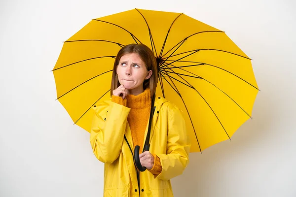 Young English Woman Rainproof Coat Umbrella Isolated White Background Having — Foto de Stock