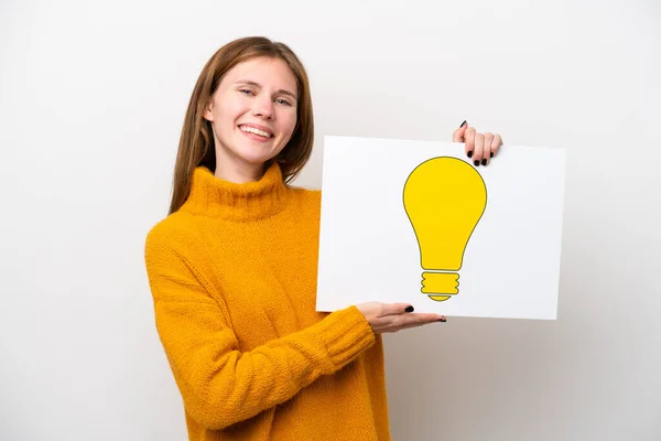 Young English Woman Isolated White Background Holding Placard Bulb Icon — Stock Photo, Image
