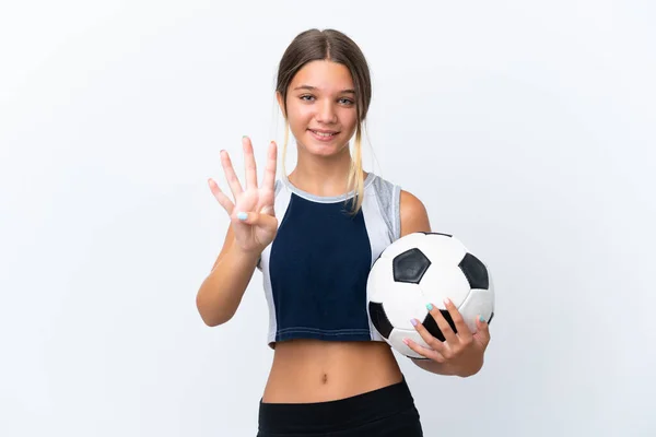 배경에서 고립된 축구를 코카서스 소녀는 행복해 하면서 손가락으로 — 스톡 사진