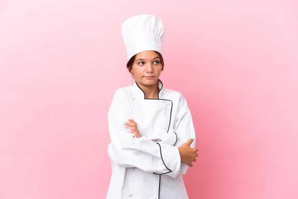 Pouco Caucasiano Chef Menina Isolado Fundo Rosa Fazendo Dúvidas Gesto — Fotografia de Stock