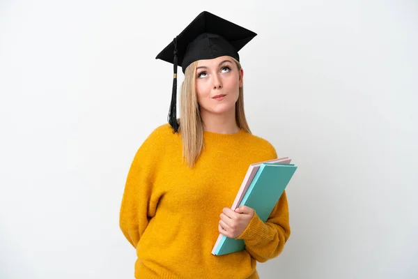 Ung Student Kaukasiska Kvinna Isolerad Vit Bakgrund Och Tittar Upp — Stockfoto