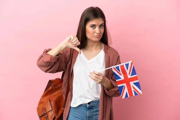 Young Caucasian Woman Holding United Kingdom Flag Isolated Pink Background — Fotografia de Stock