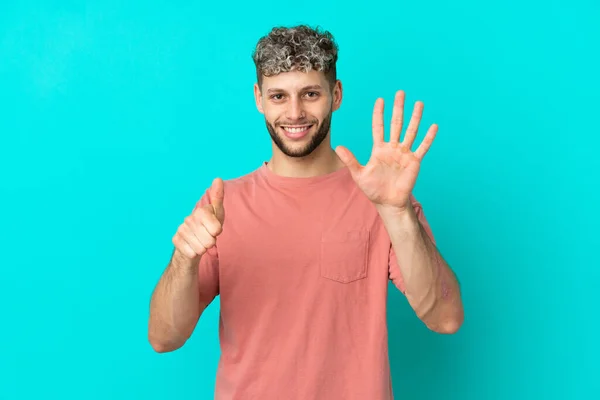 Young Handsome Caucasian Man Isolated Blue Background Counting Six Fingers — Foto Stock