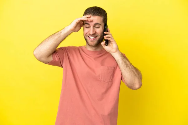 Handsome Blonde Man Using Mobile Phone Isolated Background Smiling Lot — Φωτογραφία Αρχείου