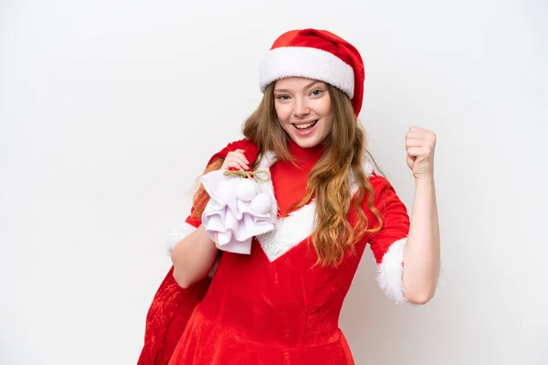 Jovem Caucasiana Com Vestido Natal Segurando Saco Natal Isolado Fundo — Fotografia de Stock