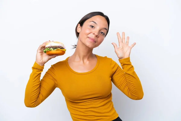 Young Hispanic Woman Holding Burger Isolated White Background Counting Five — Stock Photo, Image