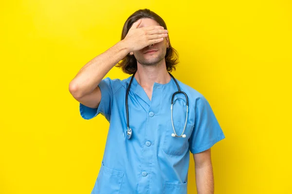 Young Surgeon Caucasian Man Isolated Yellow Background Covering Eyes Hands — Stock Photo, Image
