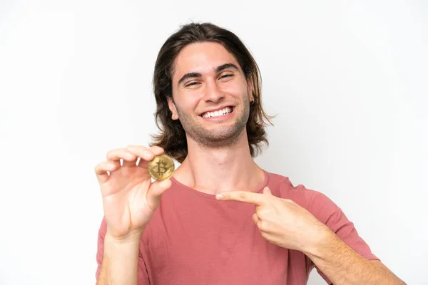 Young Handsome Man Holding Bitcoin Isolated White Background Pointing — Foto de Stock