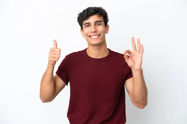Молодой Аргентинский Мужчина Изолирован Белом Фоне Показывая Знак Большой Палец — стоковое фото