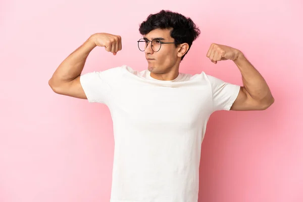 Young Argentinian Man Isolated Pink Background Doing Strong Gesture — Stock Photo, Image