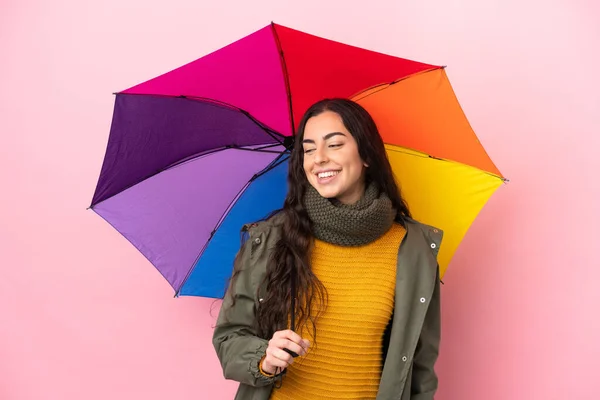 Young Woman Holding Umbrella Isolated Pink Background Looking Side Smiling — Fotografia de Stock