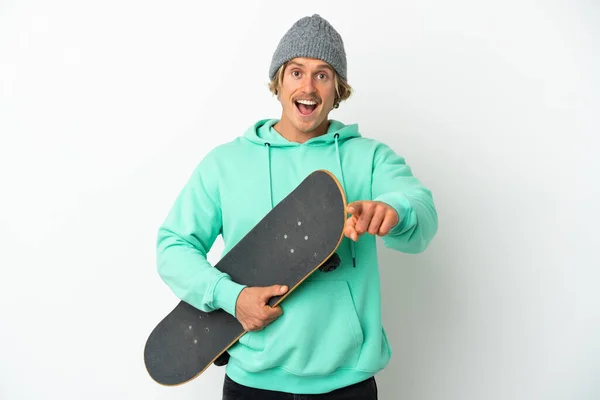 Young Skater Blonde Man Isolated White Background Surprised Pointing Front — Stock Photo, Image