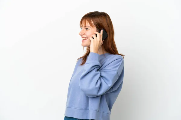 Redhead Girl Isolated White Background Keeping Conversation Mobile Phone Someone — Stock Photo, Image