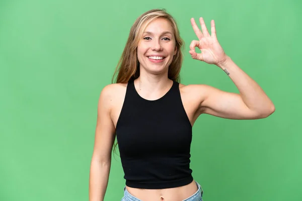Mladé Blondýny Žena Přes Izolované Pozadí Ukazující Znamení Prsty — Stock fotografie