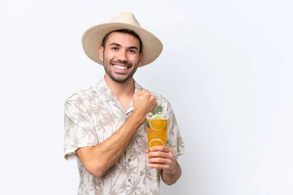 Young Caucasian Man Holding Cocktail Isolated White Background Celebrating Victory — Stock Photo, Image