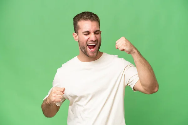 Young Handsome Caucasian Man Isolated Green Chroma Background Celebrating Victory — Stock Photo, Image