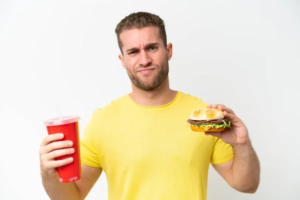 Young Caucasian Man Holding Burger Soda Isolated White Background — Stock Photo, Image