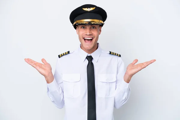 Airplane Caucasian Pilot Isolated White Background Shocked Facial Expression — Zdjęcie stockowe