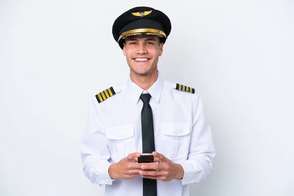 Airplane Caucasian Pilot Isolated White Background Sending Message Mobile — Zdjęcie stockowe