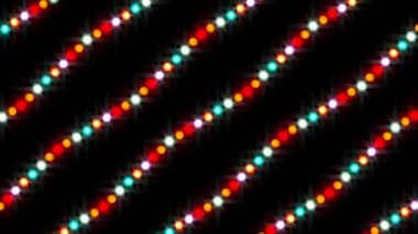 Retro style colour changing bokeh lights loop with glint glare in a wavy diagonal line pattern against a black background