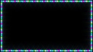 A simple looped slow colour changing twinkling frame border of Christmas or Stage lights against a black background.