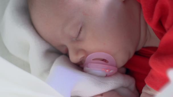 Beautiful infant baby girl in bed — Stock Video