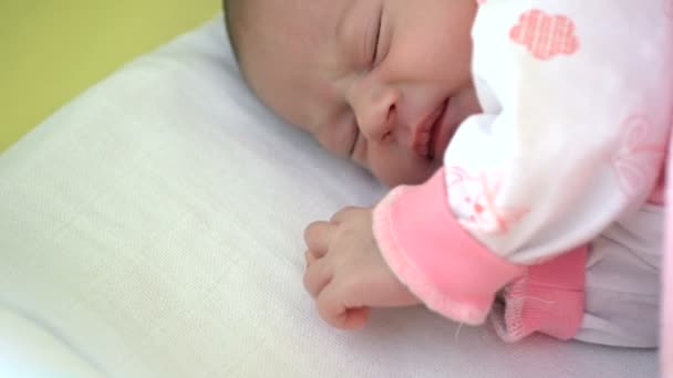 Beautiful infant baby girl in bed — Stock Video