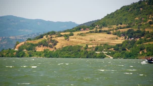 SUPER 35MM CAMERA - Peaceful look at the Danube bay from Donji Milanovac towards Romania border. — Stock Video