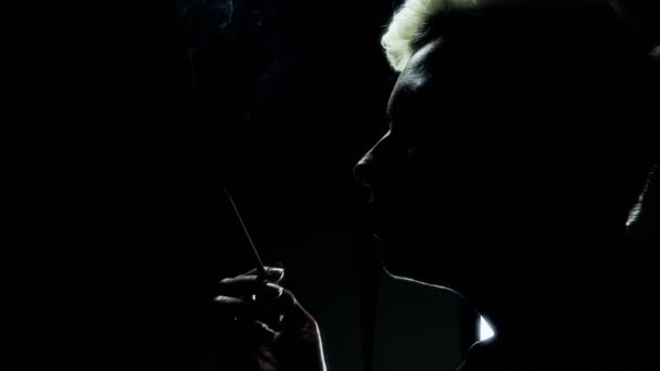 Girl with punk haircut smoking a cigarette — 비디오