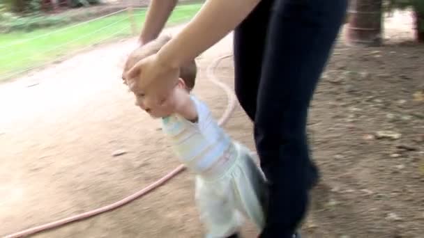 Baby boy learning to walk ( — Stock Video