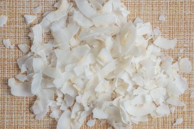 Arka planda hindistan cevizi gevreği ya da hindistan cevizi kırıntısı. Yaklaş, seçici odaklanma.