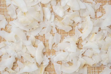 Arka planda hindistan cevizi gevreği ya da hindistan cevizi kırıntısı. Yaklaş, seçici odaklanma.