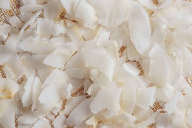 Arka planda hindistan cevizi gevreği ya da hindistan cevizi kırıntısı. Yaklaş, seçici odaklanma.