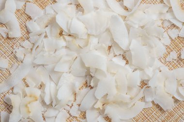 Arka planda hindistan cevizi gevreği ya da hindistan cevizi kırıntısı. Yaklaş, seçici odaklanma.