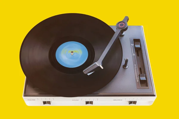 Vintage Turntable Spinning Record Yellow Background — Stock Photo, Image