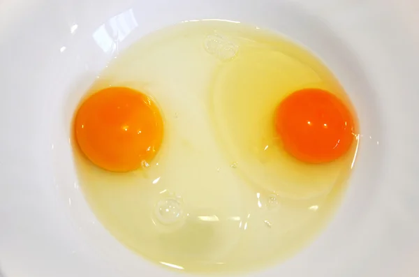 Two eggs in a plate — Stock Photo, Image