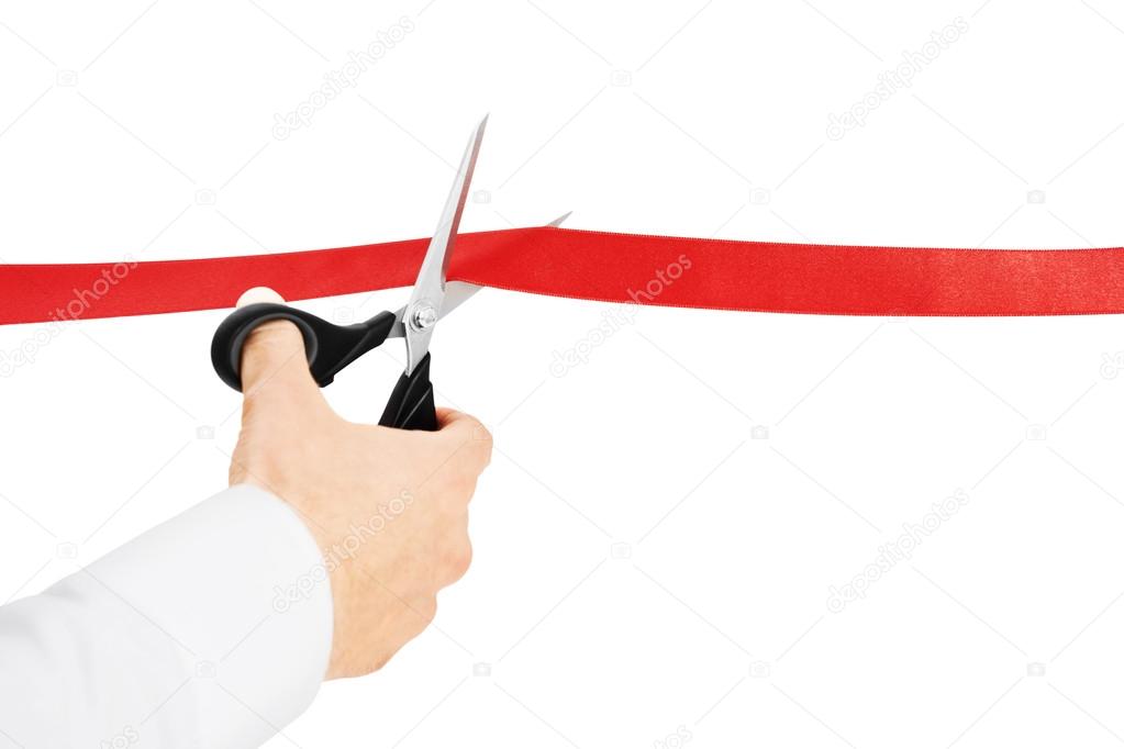 Cutting red ribbon