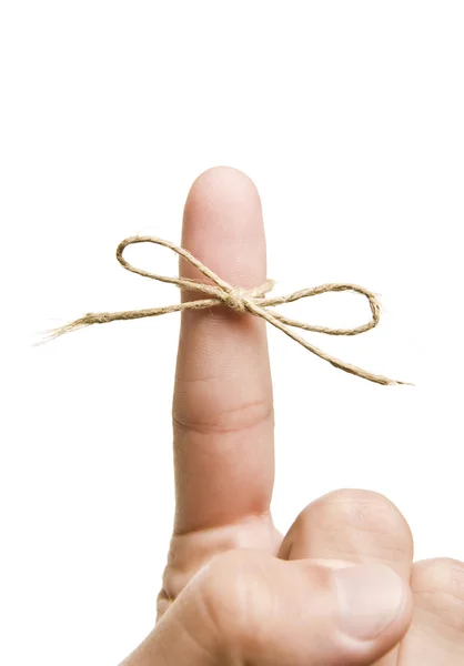 Finger with tied bow — Stock Photo, Image