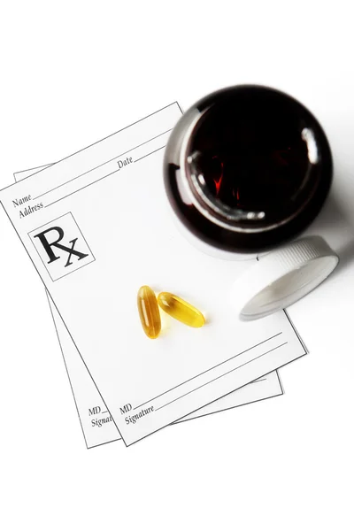 Prescription Medicine and Bottle on paper with RX symbol — Stock Photo, Image