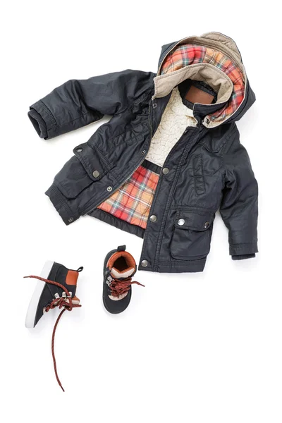 The boy's small shoes and jacket — Stock Photo, Image