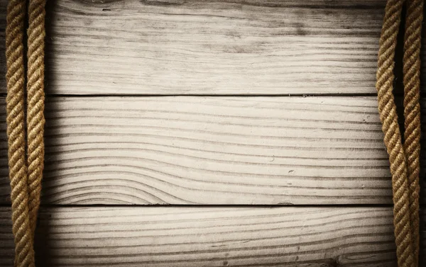 Corde su fondo di legno — Foto Stock