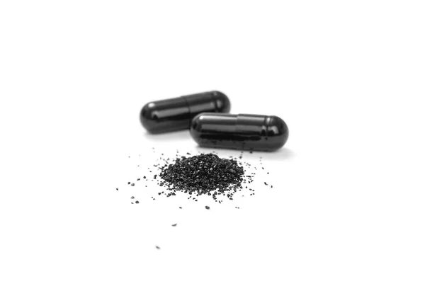 Closeup Activated Charcoal Capsules Isolated White Background — ストック写真
