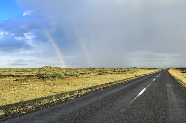 Road and rainbow — Stock Photo, Image