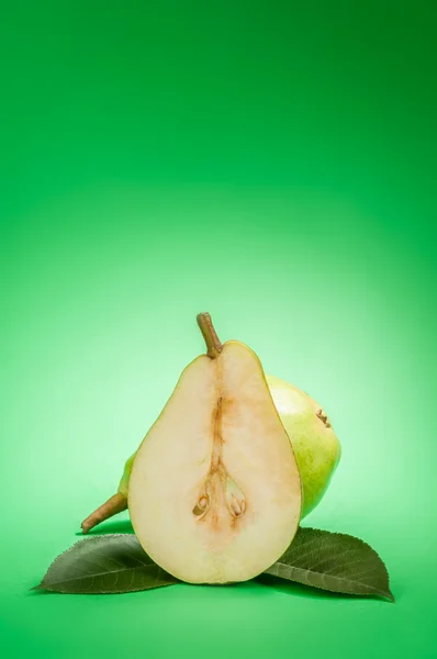 Pear on a green background — Stock Photo, Image