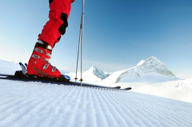 skier on untouched ski track clipart