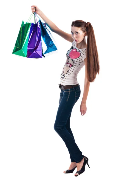 Retrato de mujer joven con bolsas de compras — Foto de Stock