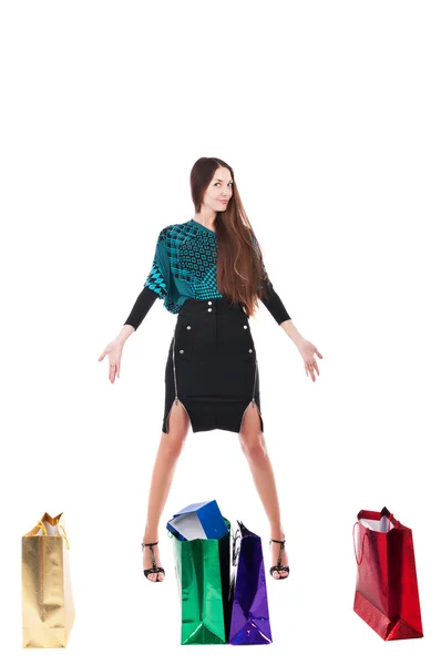 Retrato de mujer joven con bolsas de compras — Foto de Stock