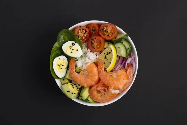 Top View Poke Bowl Shrimps Rice Vegetable Black Background Close — стоковое фото